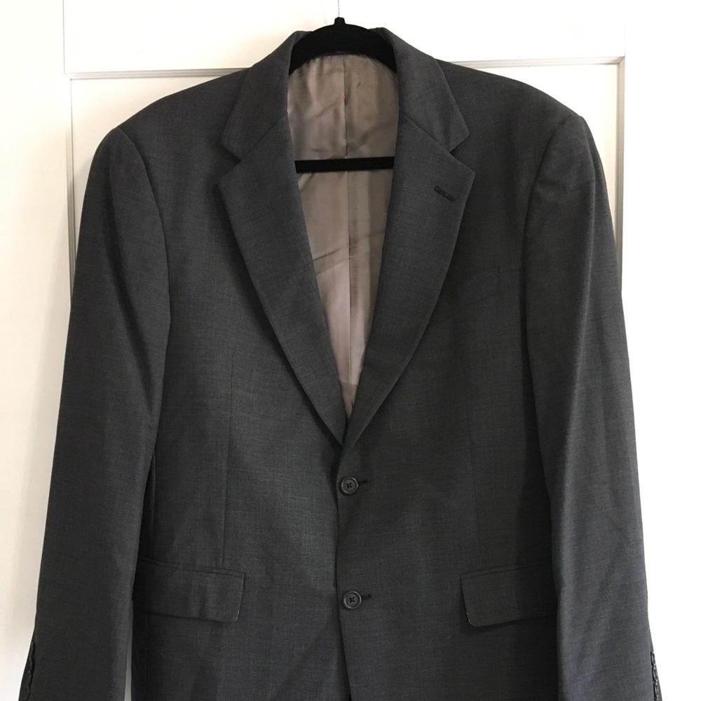 Like new men’s suit jacket and pants.